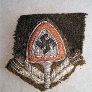 RAD Officer's Cap Insignia on Piece of "Robin-Hood" Cap